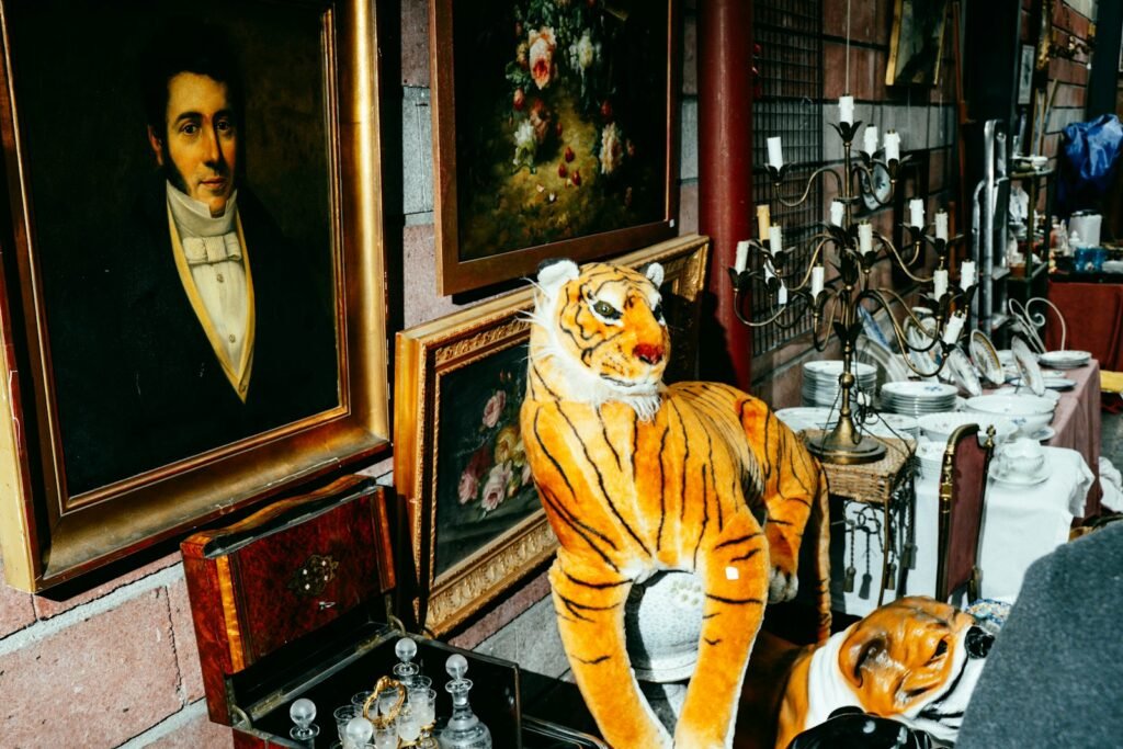 Shoppers browsing solid wood furniture at a weekend estate sale