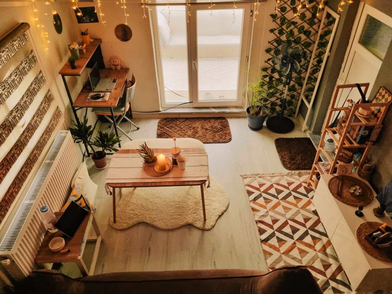 Cozy warmly lit living room decorated on a budget