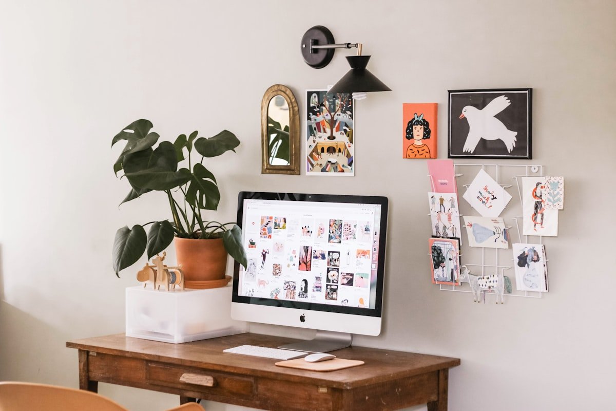 Compact home office setup on a wooden desk