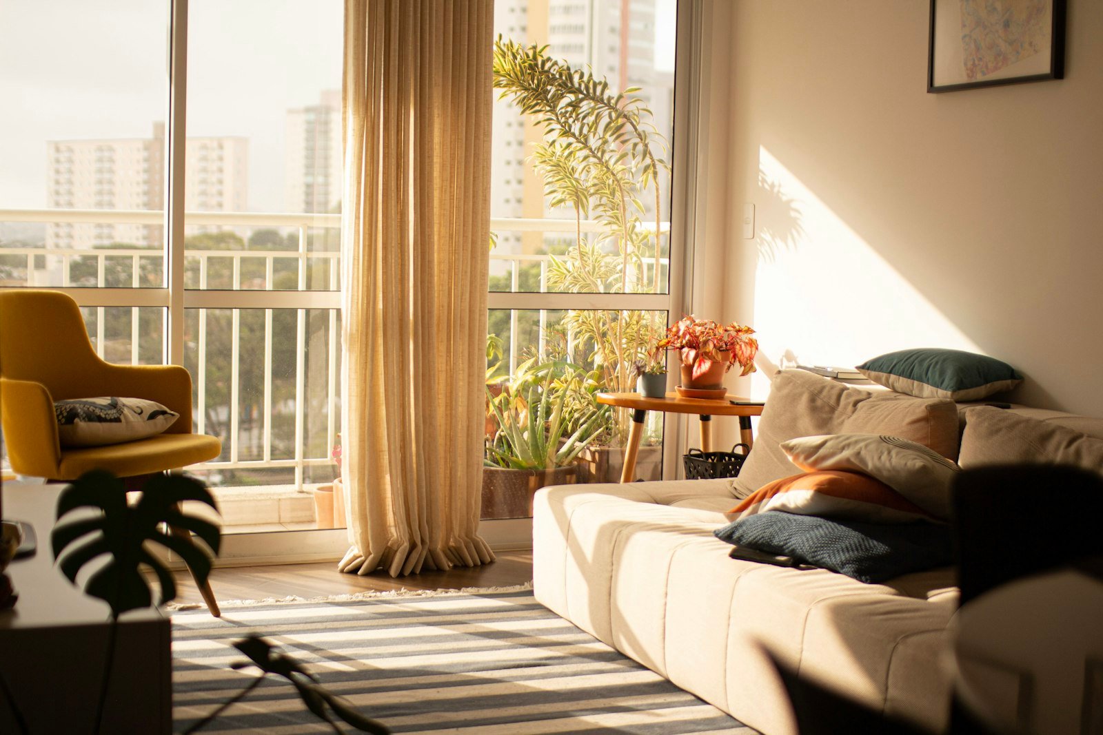 Stylish rental apartment living space decorated with removable, damage-free decor