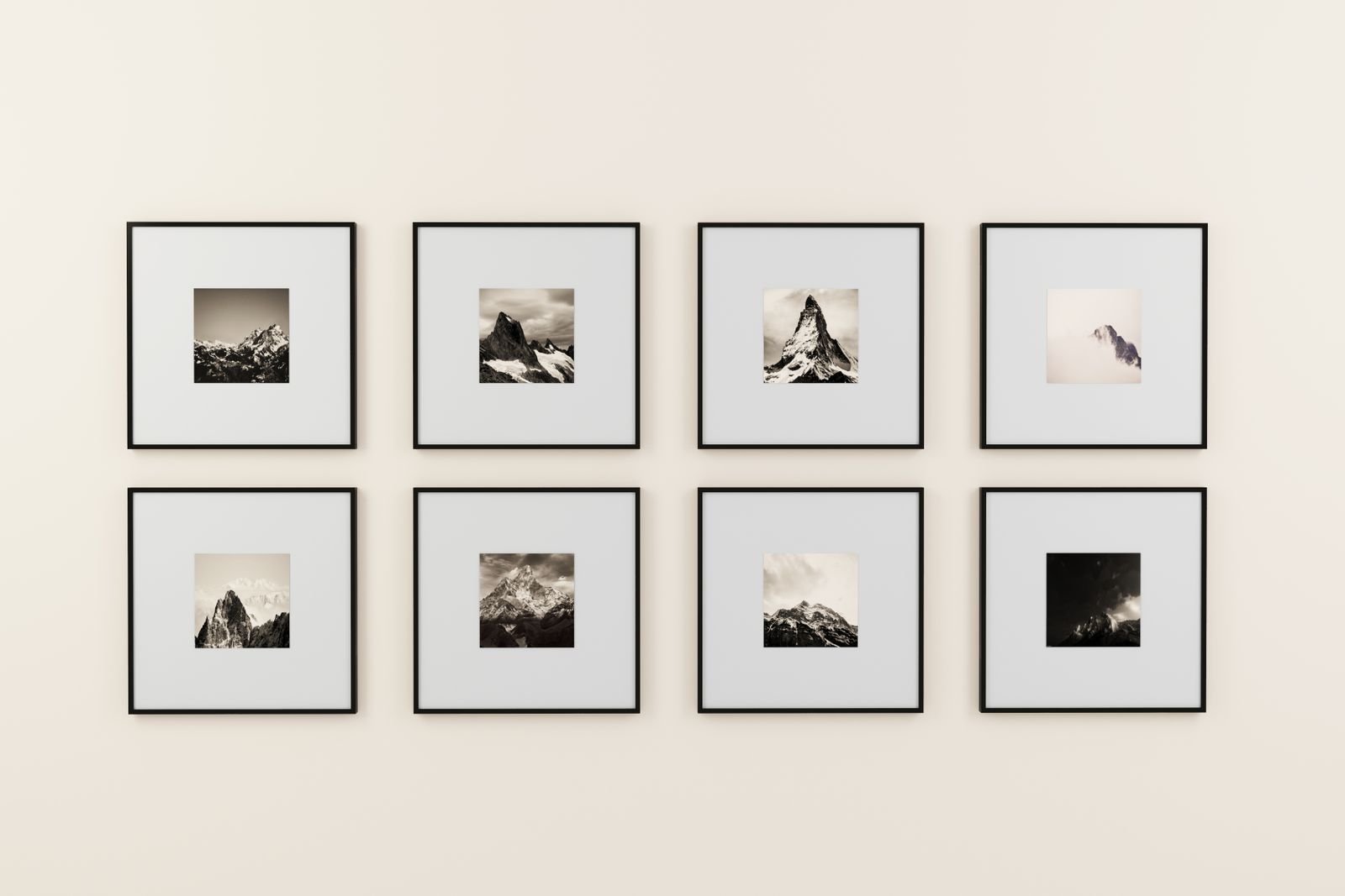Grid-style gallery wall with black and white photos