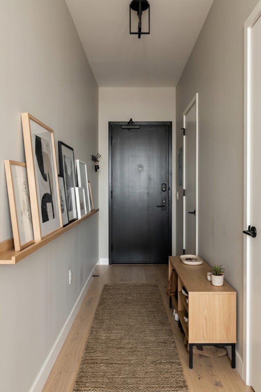 Add a picture ledge in a small apartment entryway