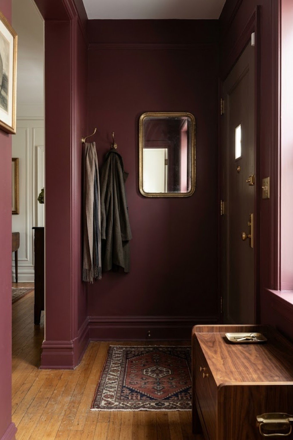 Keep the area clear and simple in a small apartment entryway